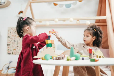 Children playing with STEAM toys