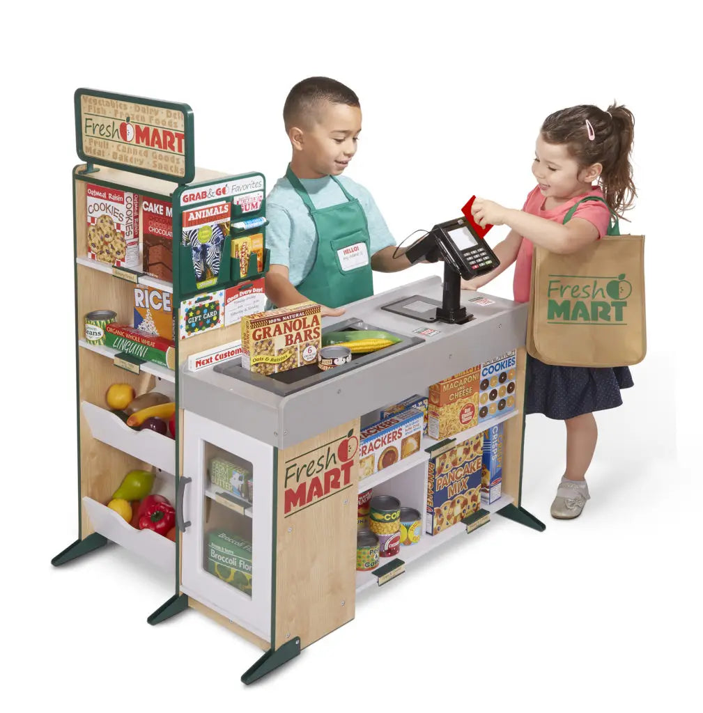 boy and girl playing with melissa doug fresh mart accessorised