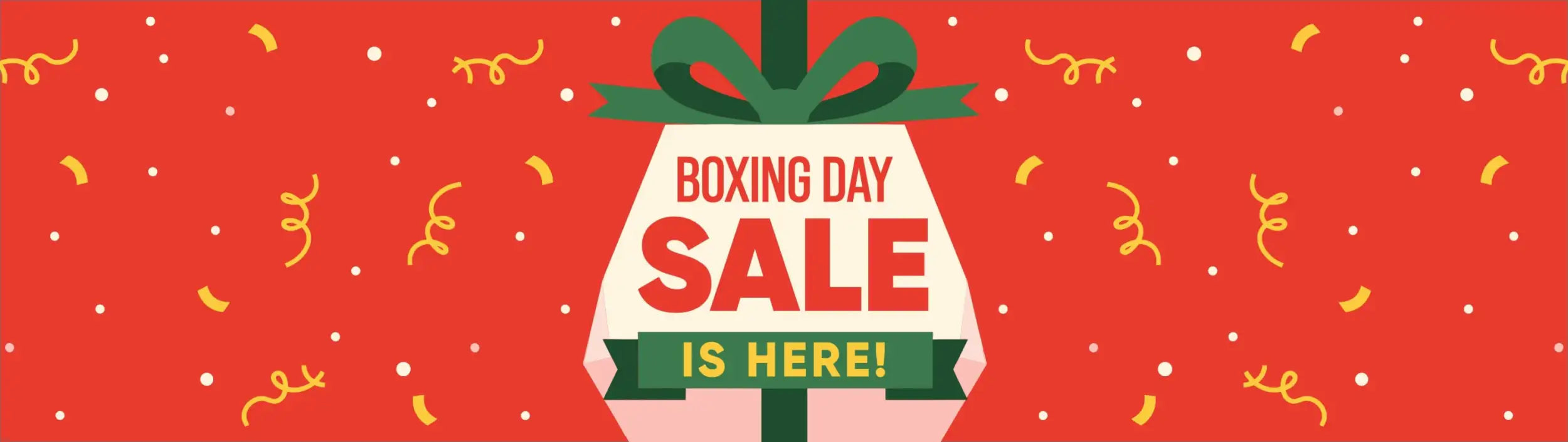 Red and white boxing day sale banner with green ribbon accents.