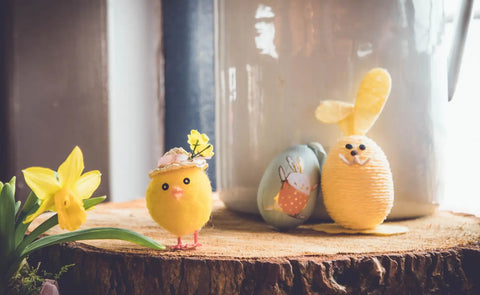Daffodil and craft spring chicks and bunnies on a log block