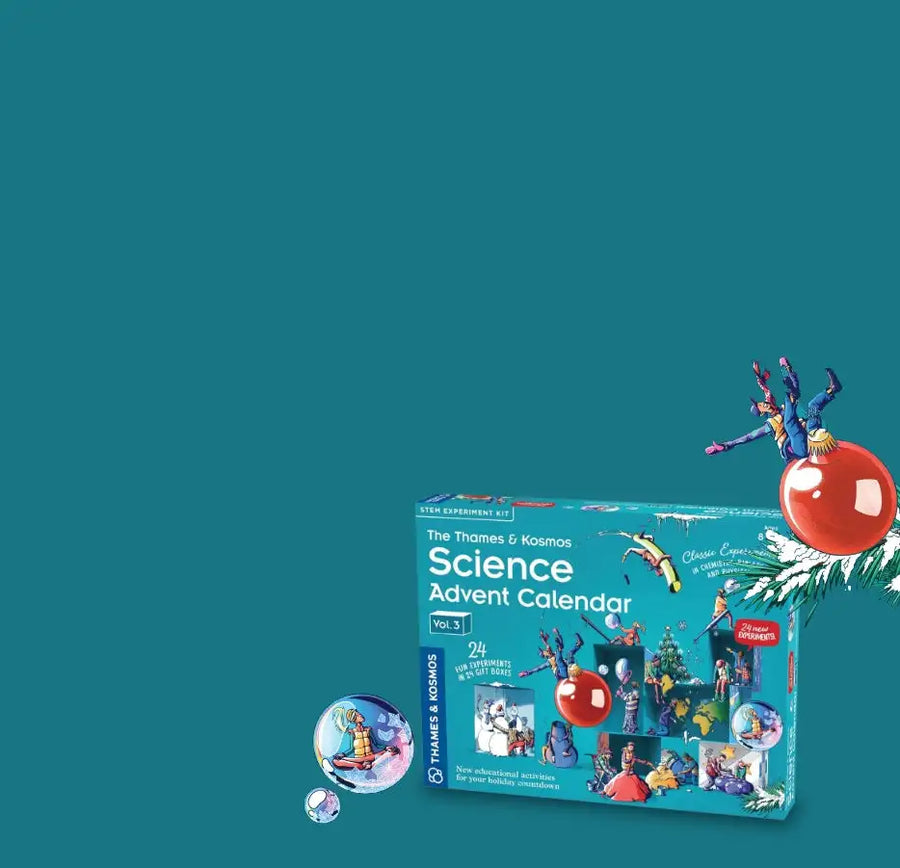 Thames & kosmos science advent calendar box with colorful illustrations and a festive red ornament.