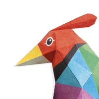 The head of a 3D paper parrot from Djeco