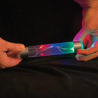 Two hands holding an Energy Stick, glowing, multicoloured tube